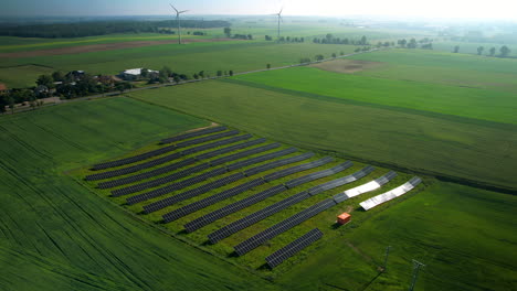 Solar-Panels-on-Field-in-Summer,-Aerial-View-of-Eco-Friendly-Energy