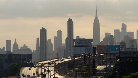 Manhattan,-New-York-City,-Skyline-Silhouetted-In-Late-Afternoon-Sun