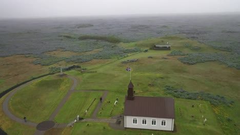 Strandarkirkja-church-in-Iceland-with-drone-video-circling-and-up