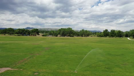A-drone-flight-just-missing-sprinklers-at-a-local-park