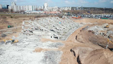 AERIAL:-Remnants-of-National-Stadium-in-Vilnius-with-Heavy-Machinery-Nearby-Ready-to-Destroy-It