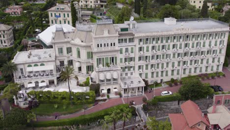 Imperiale-Hotel-in-Santa-Margherita-Ligure,-Genoa,-Italy---Aerial-Pullaway