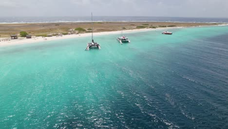 Aerial-fast-orbit-over-the-sandy-beach-of-the-Klein-Curacao-island