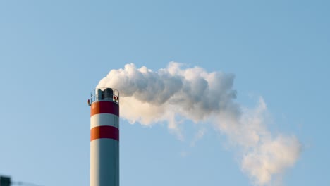 White-smoke-air-pollution-coming-from-the-pipes-on-an-industrial-factory