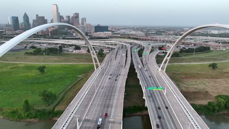 Aerial-entering-Dallas-Texas-over-Margaret-McDermott-Bridge,-interstate-30