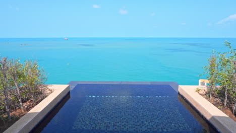 Infinity-Pool-of-Private-Villa-With-Stunning-View-of-Blue-Tropical-Sea-Skyline