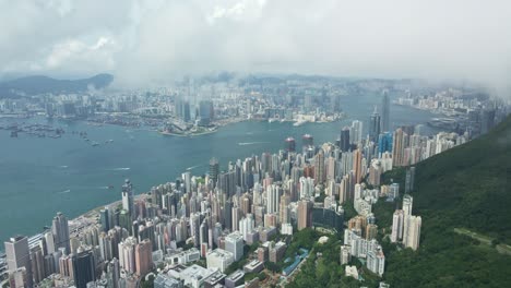 Hermosa-Vista-De-Drones-De-Hong-Kong,-Central-Y-Victoria-Habour-En-Hong-Kong-Con-Buen-Clima