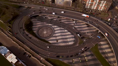 Steady-top-down-aerial-view-of-transit-roundabout-intersection-eye-in-Arnhem