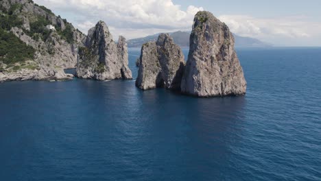 Aerial-View-Of-Amazing-Rock-Formations-In-Gulf-Of-Naples,-Italy