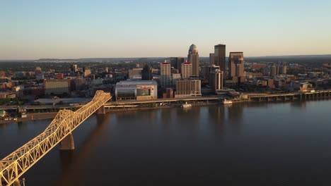 Louisville,-Kentucky-skyline-with-bridge-with-drone-video-moving-sideways-up-high