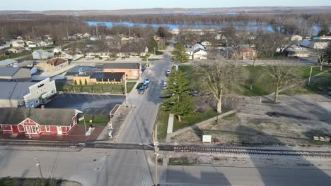 aerial-look-around-riverfront-Chillicothe,-Illinois-adjacent-to-the-mighty-Illinois-River-near-flood-stage