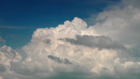 Close-up-shot-of-white-cumulonimbus-cloud-formation-in-sky