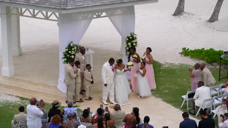 Husband-and-wife-jump-the-broom,-wedding-tradition