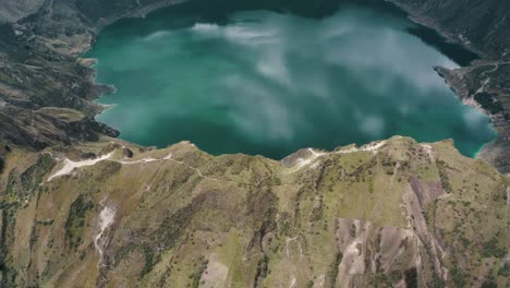 Fly-Over-Quilotoa-Crater-Lake-In-Ecuadorian-Andes-Volcano-In-South-America