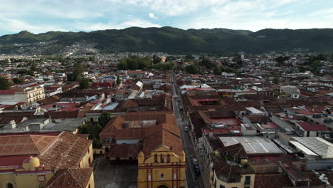 drone-shot-showing-frontally-the-descent-towards-one-of-the-main-churches-of-san-cristobal-de-las-casas-in-mexico