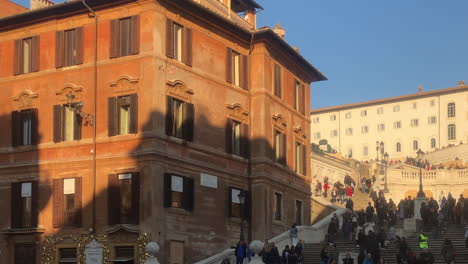 Large-crowd-of-people-visiting-the-iconic-Spanish-Steps-at-the-start-of-the-Covid-19-coronavirus-global-pandemic