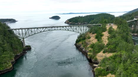 Wide-drone-shot-of-the-steel-bridge-at-Deception-Pass-in-Washington-State