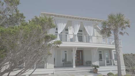 Two-story-beachfront-accommodation-with-beautiful-white-curtains-Exterior-Shot