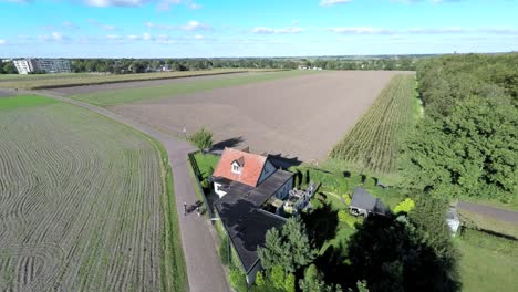Aerial-footage-of-tree-and-bikeriders-in-countryside