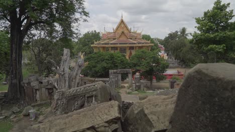 Teenagers-leaving-Ek-Phrom-temple-near-Battambang-in-Cambodia-on-a-cloudy-day