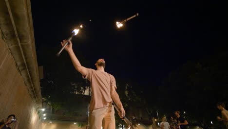 Slow-Motion-Fire-Juggling-,-Low-Angle