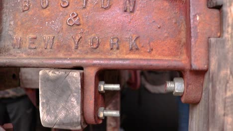 Close-up-of-rust-metal-frame-of-old-cider-press