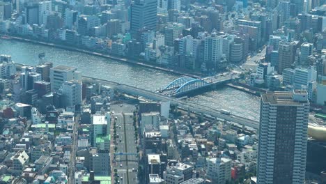 Timelapse,-Aerial-view-of-Tokyo-river-and-bridge-from-Skytree-tower