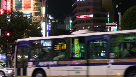 Cars-passing-the-famous-Shibuya-Crossing-in-Tokyo-Japan