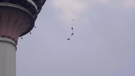 Base-jumpers-jumping-from-Menara-tower-in-Kuala-Lumpur