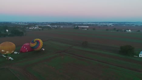 Hot-Air-Balloons-Taking-off-on-a-Foggy-Autumn-Morning