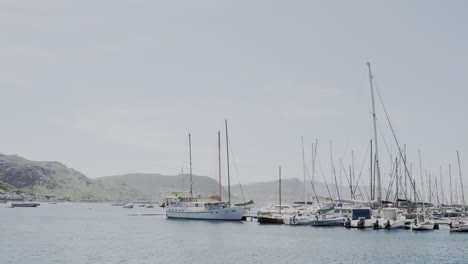 Time-lapse-of-white-sailing-boats-in-Simon's-Town-Harbour