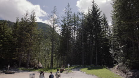 Wide-shot-of-hikers-walking-on-the-trail-in-Canadian-wilderness