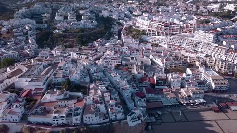 Drone-shot-of-a-city-buildings-in-Albufeira,-Portugal