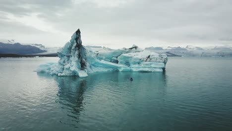 an-aerial-of-a-kayaker-in-jokulsarlon-glacier-lagoon