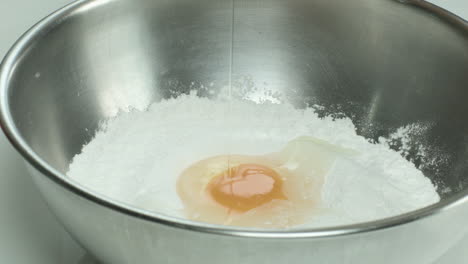 Adding-Egg-on-Flour