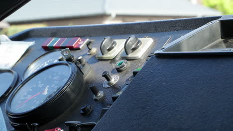 Shot-of-the-instrument-panel-and-dashboard-of-an-old-bus-coach