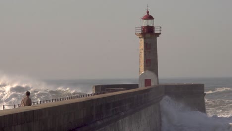 ocean-big-waves-crash-over-the-lighthouse