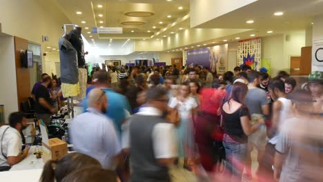 Timelapse-of-a-busy-crowd-of-people-inside-the-Cyprus-Comic-Con-in-Nicosia,-Cyprus