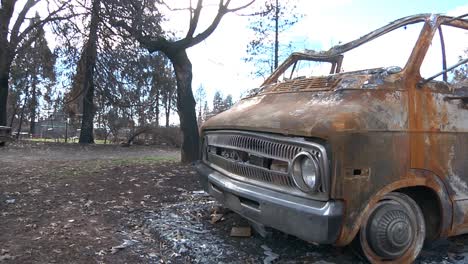 Camp-Fire-Destruction-Burned-Car-Slow-Pan-to-Burned-House