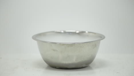 Water-poured-over-dry-ice-in-a-bowl