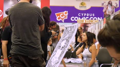 Vendors-sell-their-wares-at-their-booths-inside-the-Cyprus-Comic-Con-in-Nicosia,-Cyprus