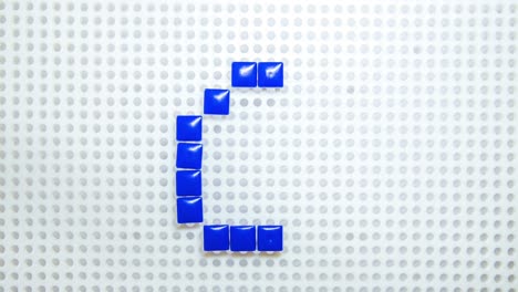 Stop-Motion-Der-Zahl-6,-Die-Jeweils-Ein-Pixel-Erzeugt,-Hergestellt-Mit-Kinderspielzeug