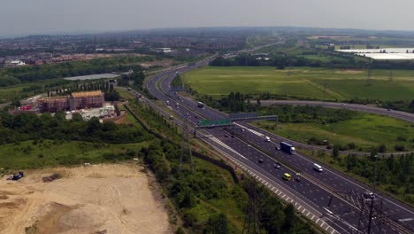 Tracking-shot-of-traffic-using-the-M2--A2-motorway-located-in-Kent,-UK