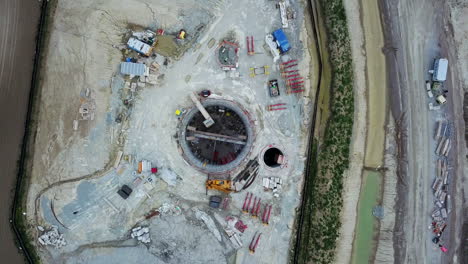 Drone-spiralling-above-a-large-industrial-construction-site