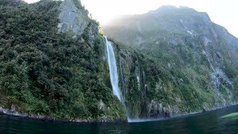 Beautiful-waterfalls-while-cruising-around-Milford-Sound-in-New-Zealand