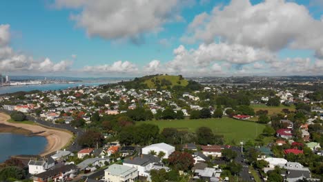 SLOWMO---Flying-over-houses-in-Auckland,-New-Zealand