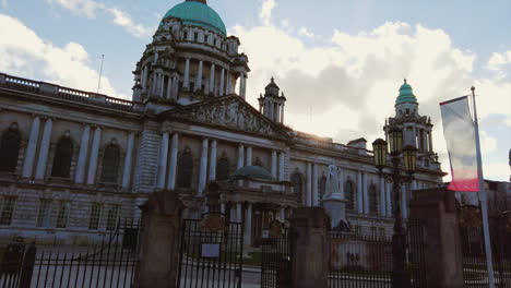Belfast-city-hall-almost-silhouette-with-blue-sky-and-white-fluffy-clouds-2019-spring