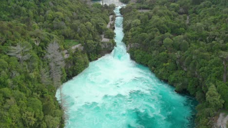 Aerial-drone-descending-shot-of-Huka-Falls-and-raging-Waikato-river-near-Lake-Taupo,-New-Zealand