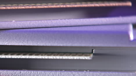 Pins-on-Vintage-Super-Nintendo-Cartridges-in-Purple-Light-SLIDE-RIGHT