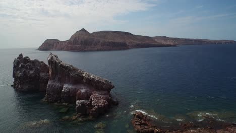 Aerial-drone-shot-of-"La-Lobera"-in-the-Partida-Island,-Baja-California-Sur